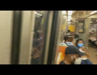 Guy plays video game laptop case train 