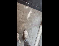 Filmer walk in building hallway with flood