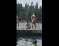 Woman sit boardwalk show butt kids swim