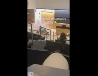 Physics professor uses fire hydrant car across classroom