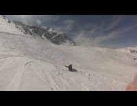 Skier does a backflip and lands on tips of skis, falls down into snow