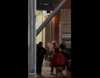 Woman Nicki Minaj costume sing shout street