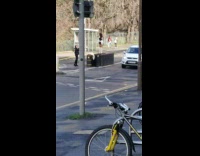 Girl stands in middle of street
