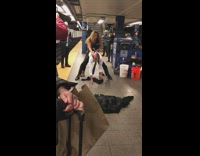 blonde girl dancing behind old man in suit