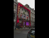 Woman lots of bags  house christmas decorations