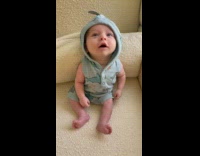 Collab ClipsIG - Baby with Hiccup Sneezes while it Stares at Lady