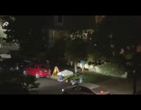 Two girls sit on white mattress sidewalk 