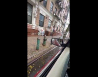 Man car wash with broken fire hydrant