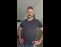 Guy takes shirt off while wishing friend happy birthday