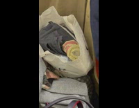 woman on bus has human teeth in a bag