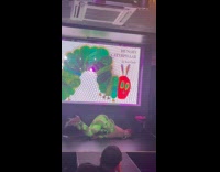 Drag queen moves as caterpillar on stage