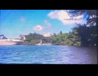 Shirtless guy rides electric surfboard fail 