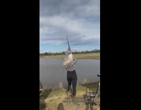 Woman throws items and shoots them 