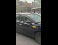 Couple makes music video middle of road