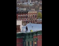 Neon green yellow jacket girl rooftop