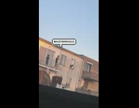 Man balcony tiktok video neighbor window