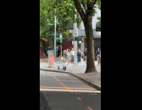 Collab IITW - Woman tank top dances at pedestrian lane