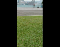 Girl dances takes jacket off river park 