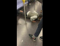 Guy does push ups on subway 