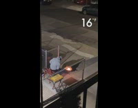 Man grey jacket grill on street night