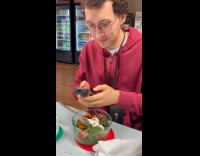 Man demonstrating features of unihertz phone