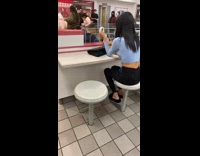 Girl blue sleeves phone ring light table