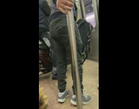 Guy sits on motorcycle in train