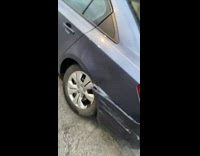 Car accident hit and run leaves license plate behind