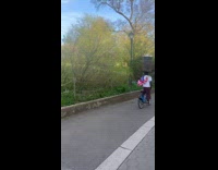 Collab WINY - Man ride bike balance barrel  on head