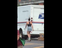 Woman roller skates balance Gatorade on head