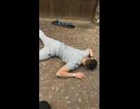 Grey Sweatpants On Skateboard Falls Down on Sidewalk