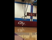 Guy shirtless kicks basketball across court into net swish