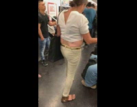 Woman has the word negro tattooed on her back tramp stamp on subway train
