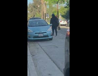 Girl pink shirt vlog outside talk stranger