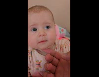 Filmer flicks the double chin of baby