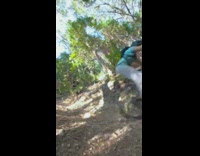 Biker in orange helmet flips falls on trail 
