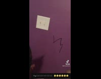 Little girl uses cleaner incorrectly on wall