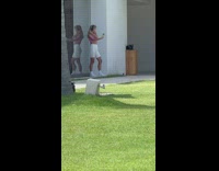 Woman headphones purple sports bra take selfie