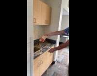 Guy opens coke bottle burst in sink