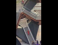 Girl anime cosplay walk down spiral staircase