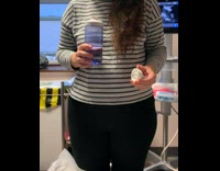 Man Shows Book Advertisement on Top of Door