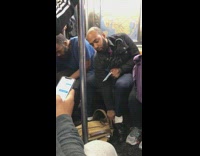 man gives up shoes to homeless man next to him