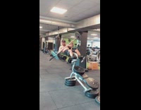 Guy pretends to kayak at gym 