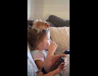 Collab Clips MPUGC - Kid watching while hamster sits on her head