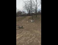 Guy bicycle wood pallets shoe falls off