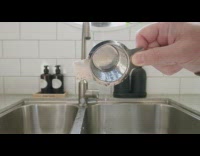 Metal strainer makes high pitched noise 