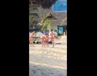 Girl red bikini cover face palm branch