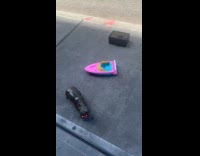 Guy set up random object on sidewalk