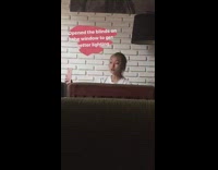 Blonde girl poses for selfies. Opened blinds for better light