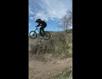 Guy riding blue bicycle falls fail hill 